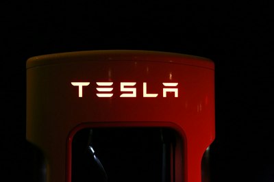 GM to Jump on Tesla Charging Network - Insurance Claims News Article