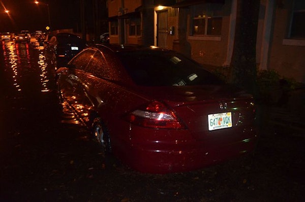 Storm Floods South Florida, Many Vehicles Submerged