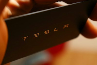 Theft Scheme Explains Charred Tesla On Frozen Vermont Lake  - Insurance Claims News Article
