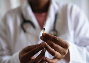 The COVID-19 Vaccine Mandate Debate - Insurance Claims News Article