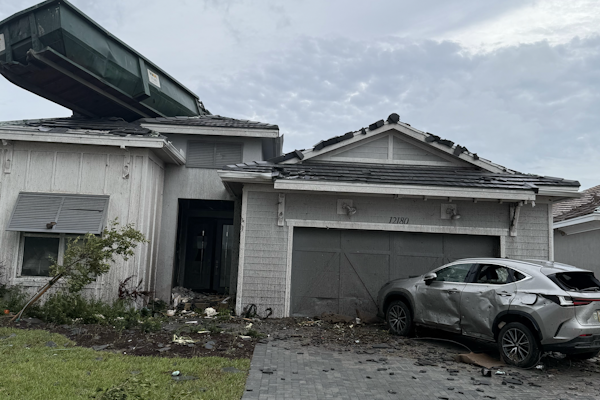 Tornado Sends Industrial Dumpster Onto Roof in Palm Beach Gardens Neighborhood