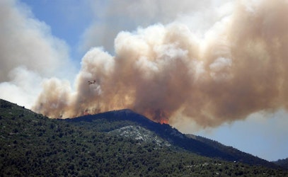 New Mexicans Prepare To Evacuate As Wind-Driven Wildfire Grows (NPR)