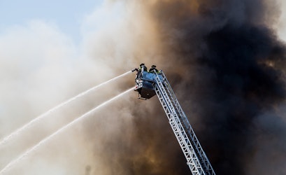 Fire Rages Through Luxury Apartments Under Construction In Oklahoma City (The Oklahoman)