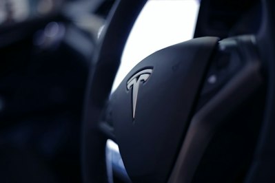 Tesla On Autopilot Crashes Into Florida Police Car - Insurance Claims News Article